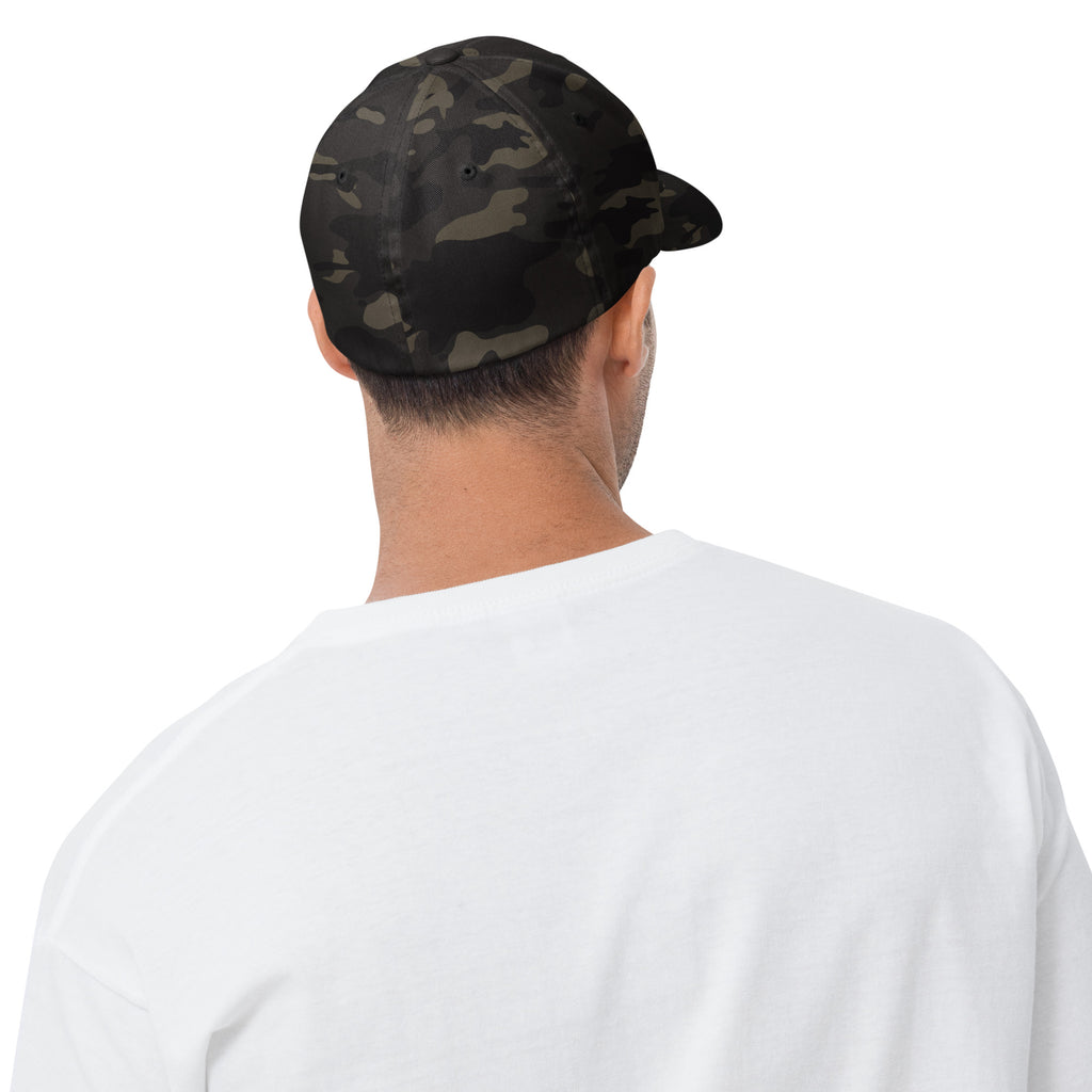Back view of the multicam black structured twill cap showing the adjustable strap
